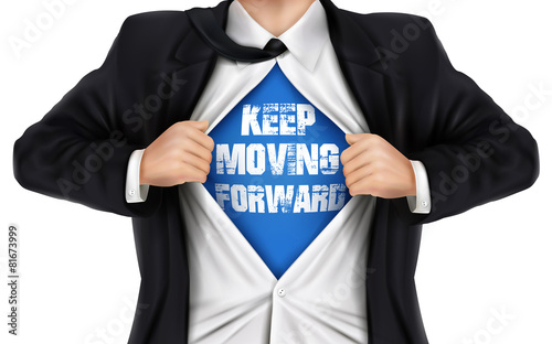 businessman showing Keep moving forward words underneath his shi