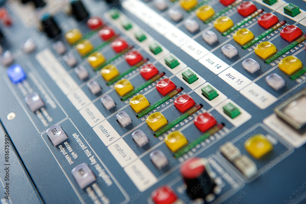 Buttons and knobs on audio mixer