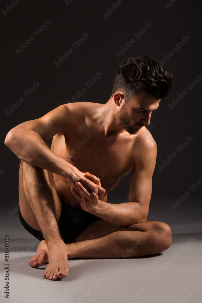 Fototapeta premium Beautiful and health athletic muscular young man.