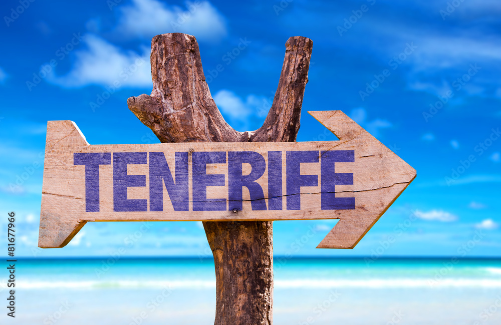 Tenerife wooden sign with beach background