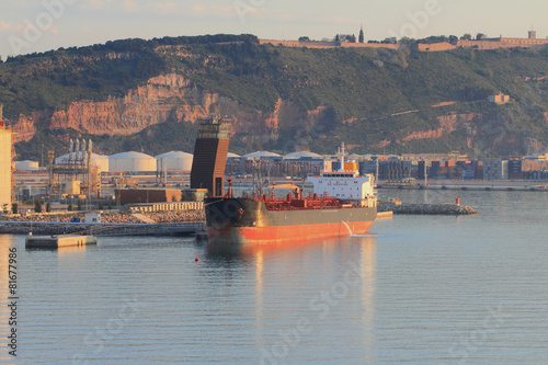 Photography Fuel and cargo tanker in port. Barcelona, Spain