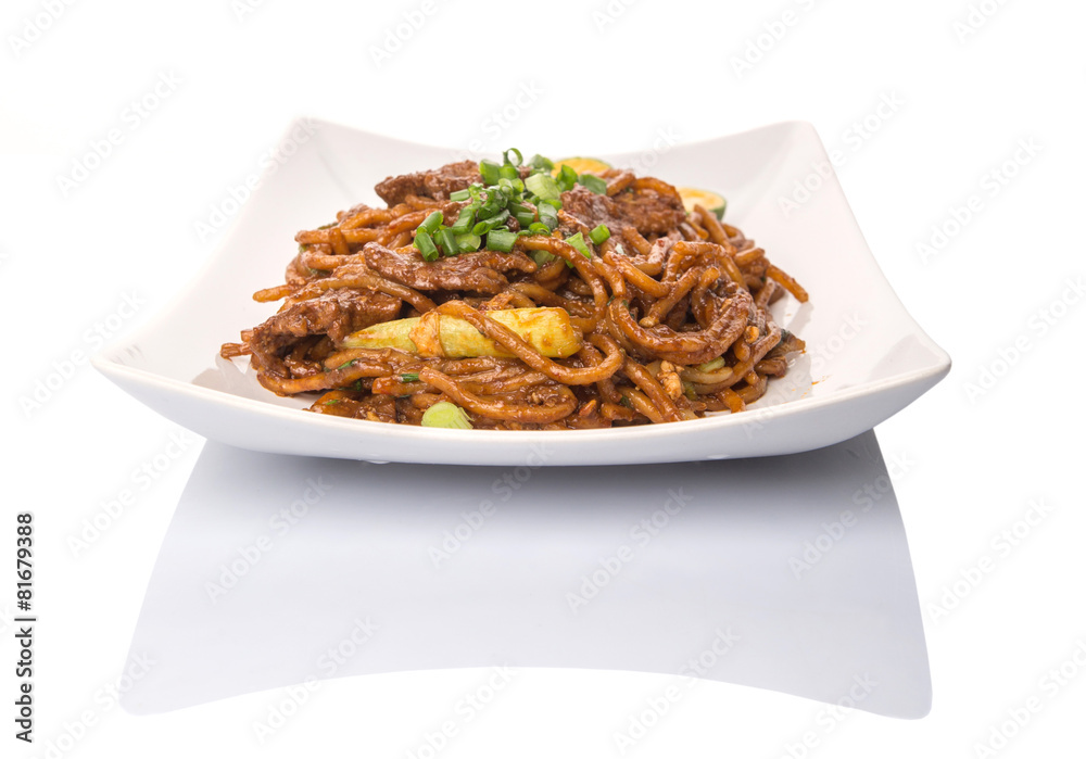 Popular Malaysian stir fried noodles on white plate Popular Malaysian stir fried noodles on white plate