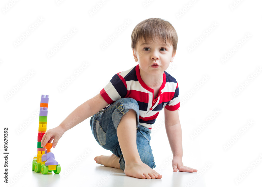 kid playing with building blocks