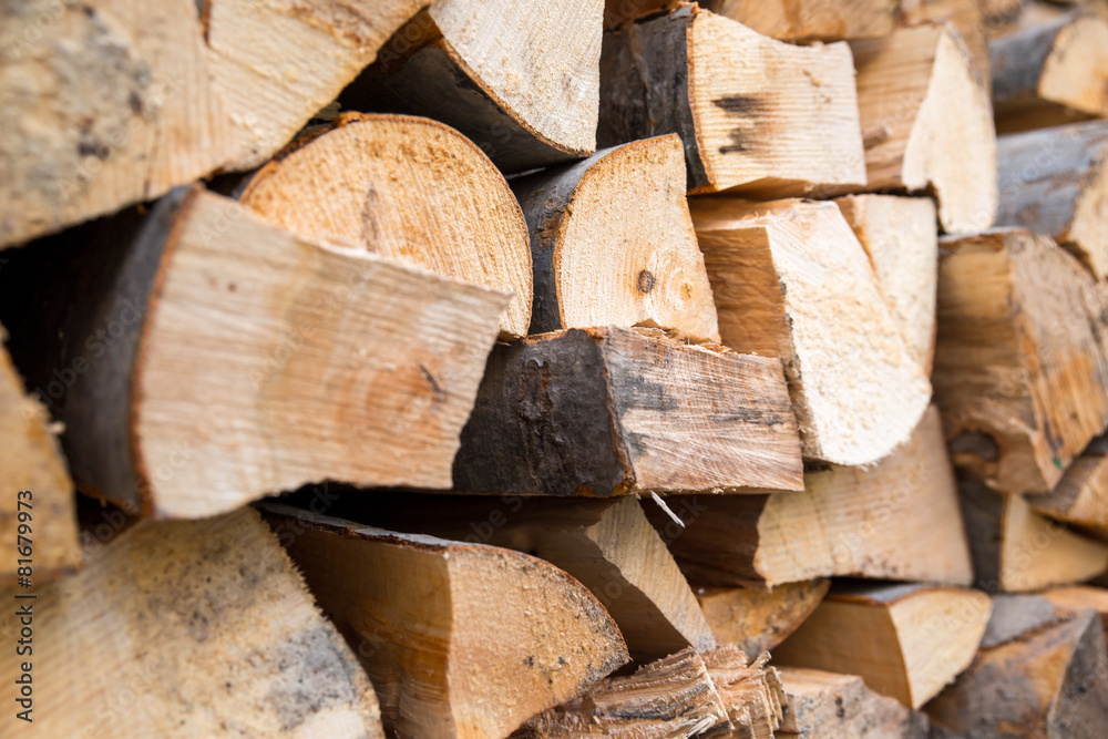 Dry chopped firewood logs ready for winter. Dry chopped firewood logs ready for winter.