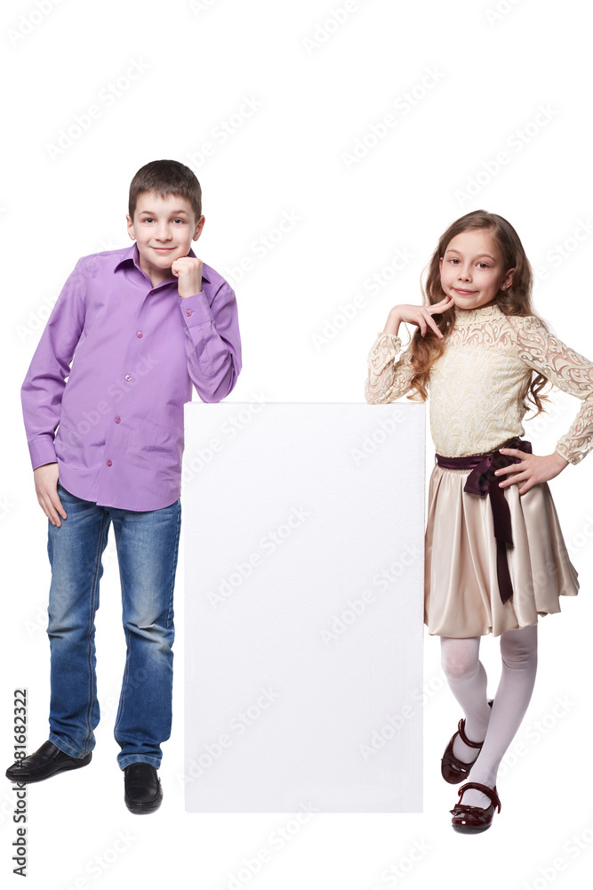 Little girl and boy beside a blank. Isolated on white background Little girl and boy beside a blank. Isolated on white background
