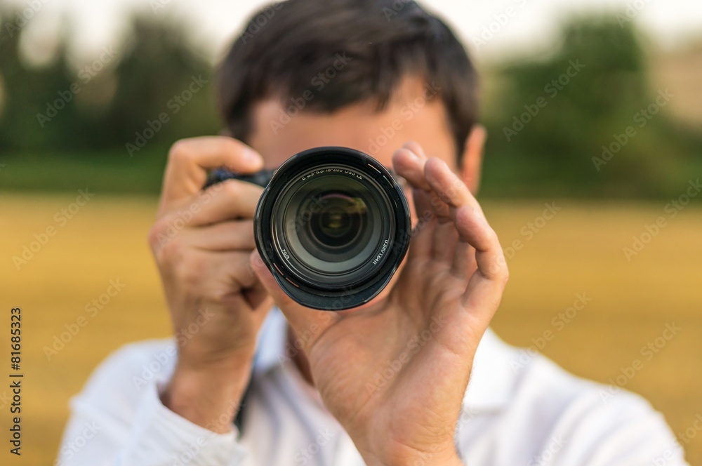 Young photographer take photo of nature Young photographer take photo of nature