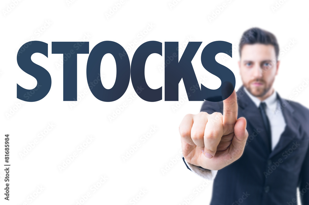 Business man pointing the text: Stocks Business man pointing the text: Stocks