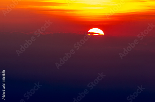Fototapeta Naklejka Na Ścianę i Meble -  Amazing sunset behind the clouds