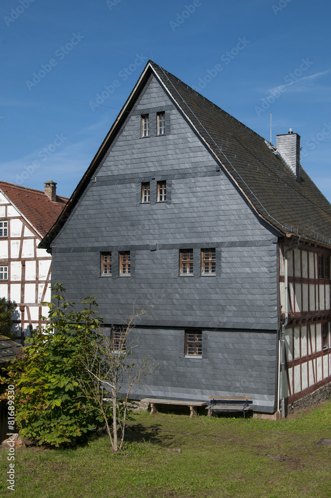 Fototapeta premium Slate shingled wall at half-timbered house