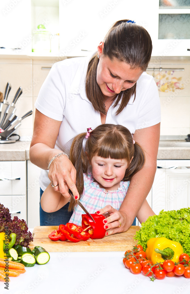 mother and kid preparing healthy food mother and kid preparing healthy food