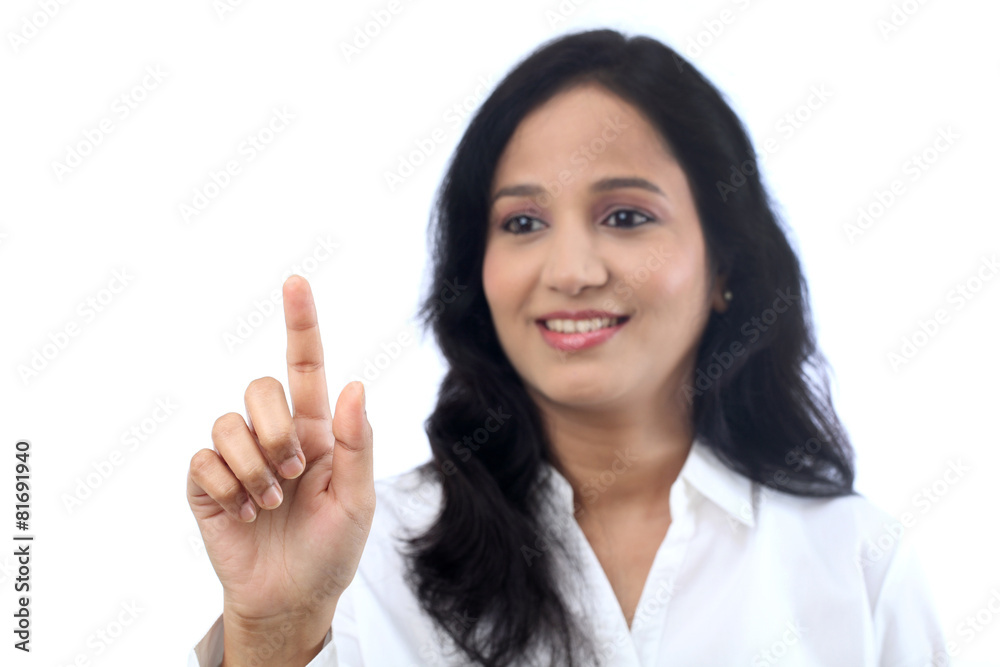 Young businesswoman touching virtual screen Young businesswoman touching virtual screen