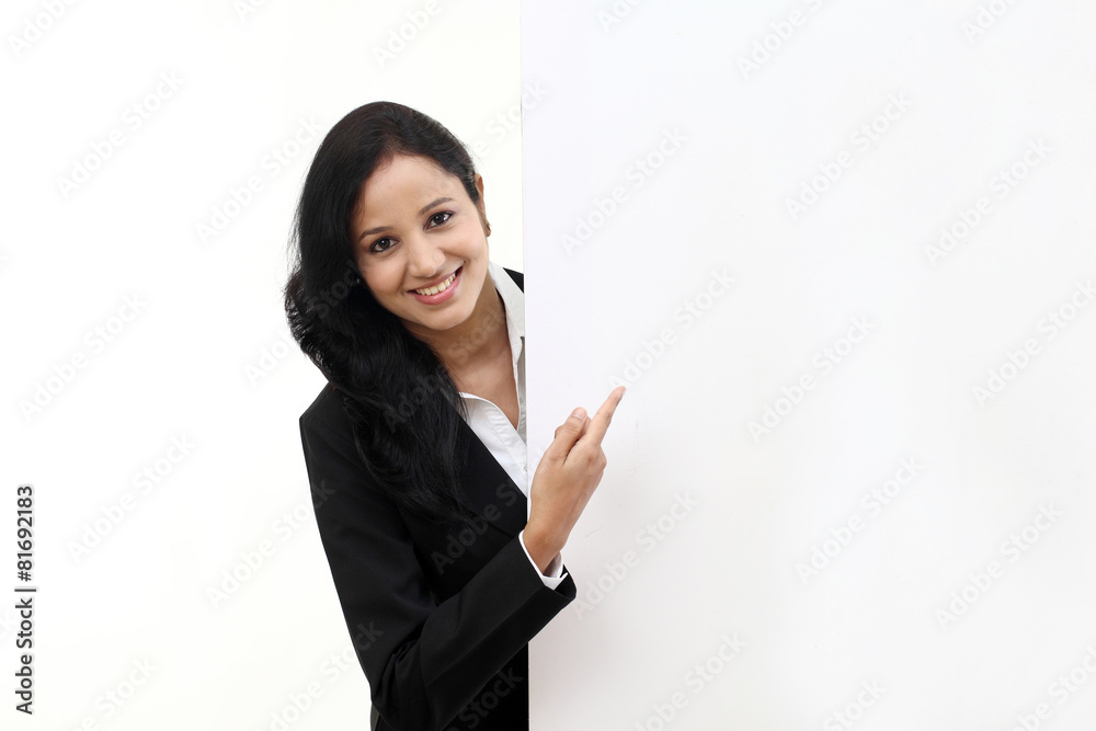 happy business woman showing blank signboard happy business woman showing blank signboard