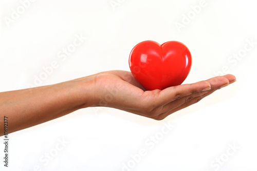 Hand holding Red heart shape