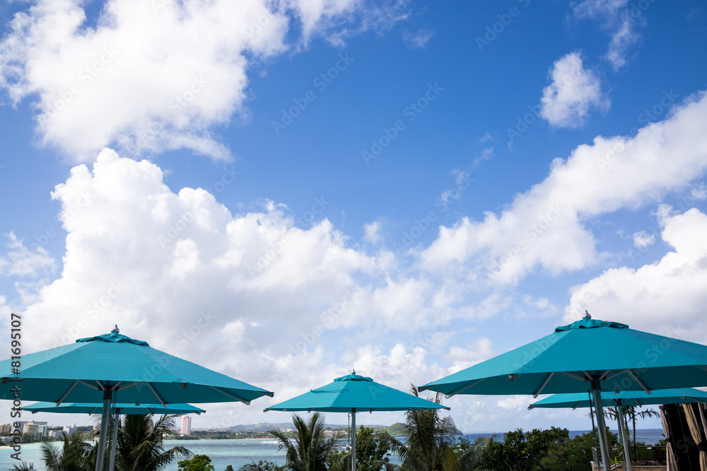 blue parasols with blue sky background in a sunny day