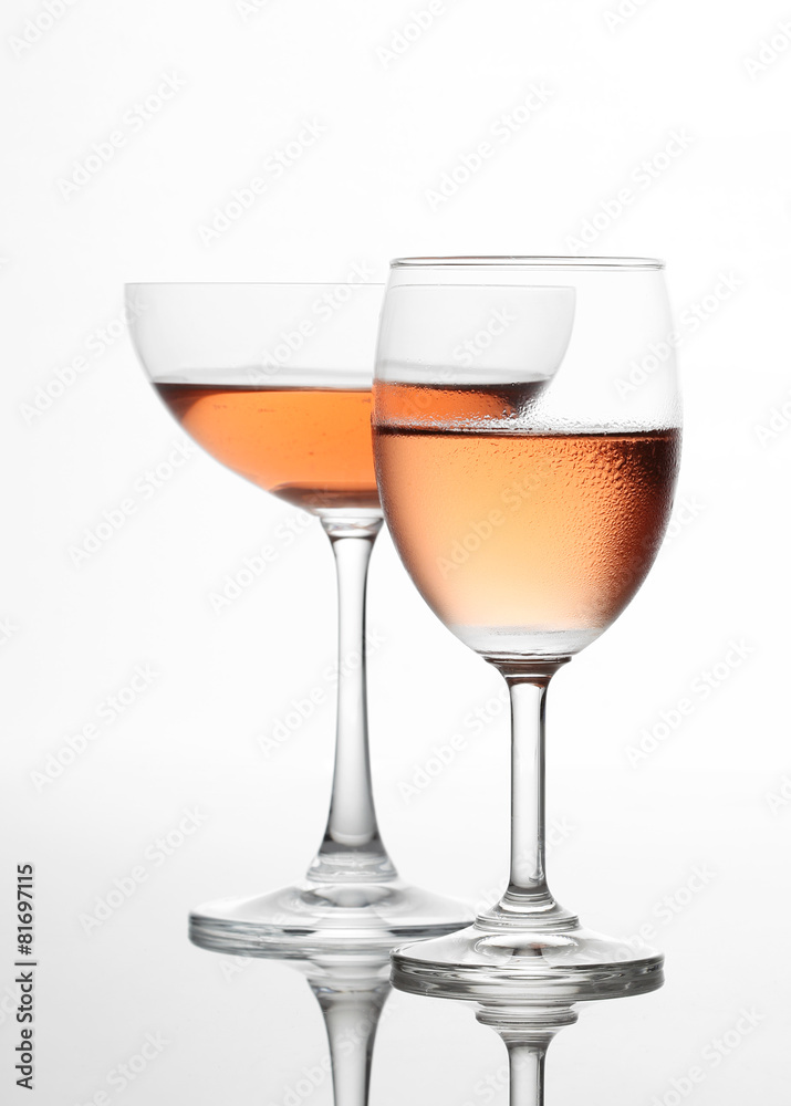 The sparking rose wine in the wine glass couple set The sparking rose wine in the wine glass couple set