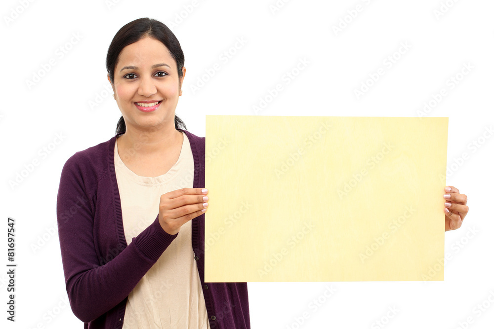 Smiling young Woman holding blank wood sheet Smiling young Woman holding blank wood sheet