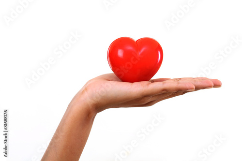 Hand holding Red heart shape
