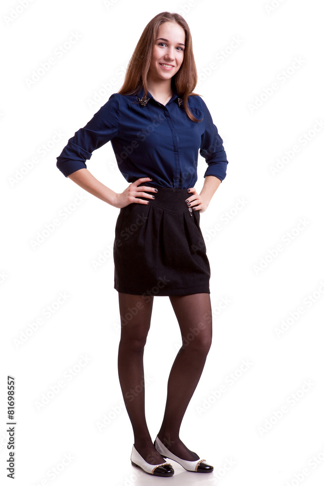 Fototapeta premium Smiling student in blue shirt full body on white background