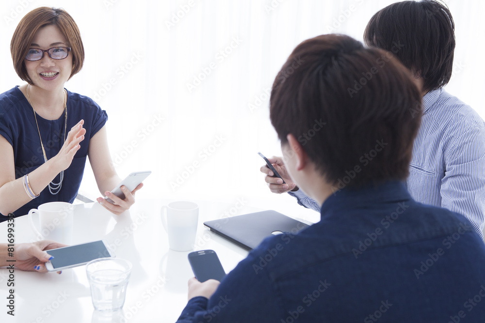 Men and women are using a mobile phone Men and women are using a mobile phone