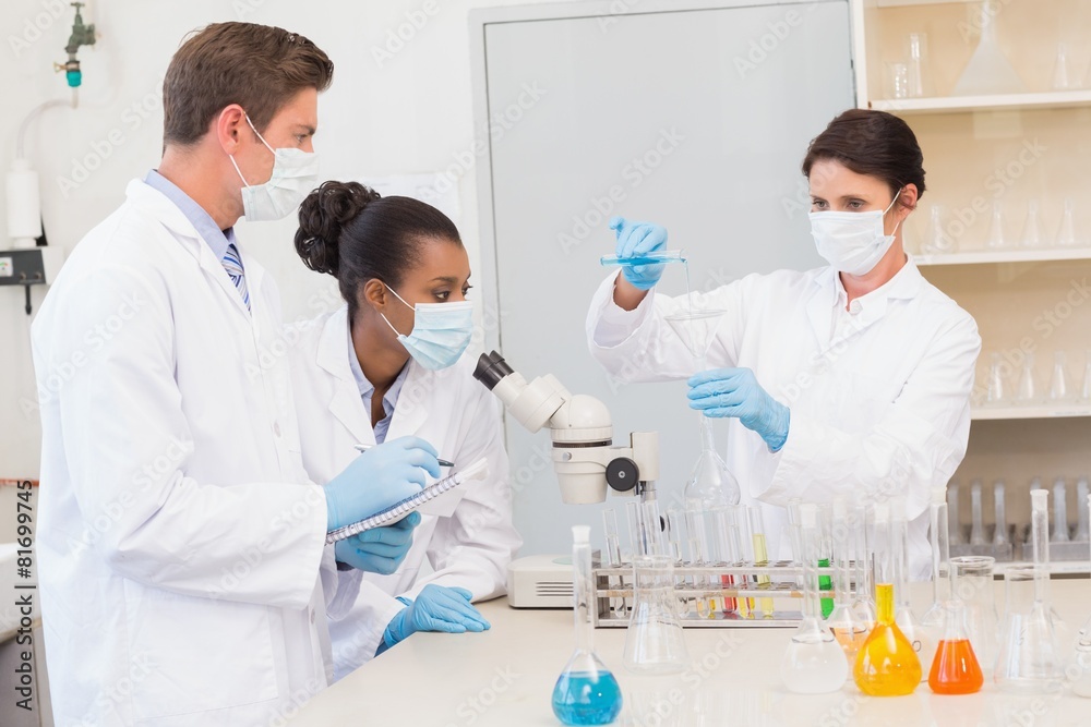 Scientists doing experimentations Scientists doing experimentations