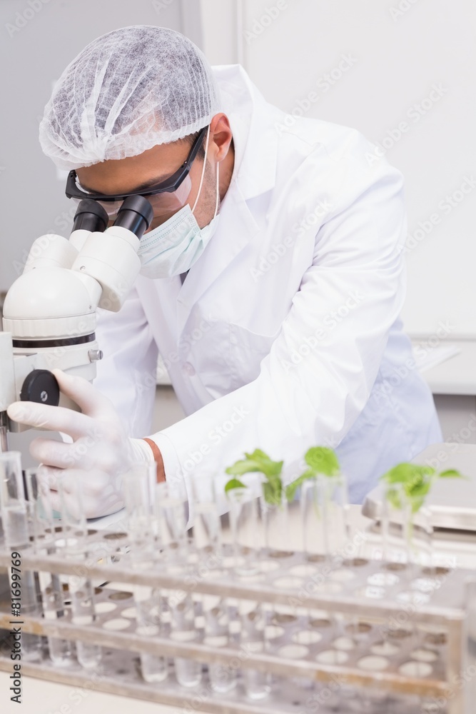Focus scientist using microscope Focus scientist using microscope