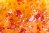Extreme abstract detail of sweet chilli sauce.