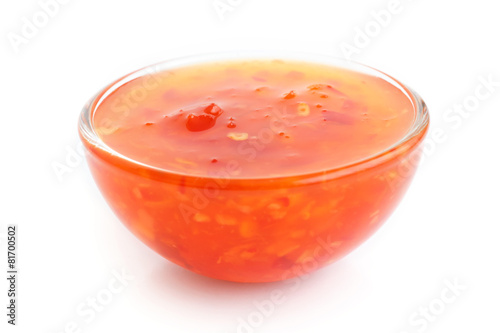 Sweet chilli sauce in small glass dish.