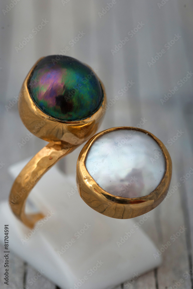 Jewelry ring on old wooden table Jewelry ring on old wooden table