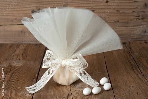 Wedding favor on old wooden table