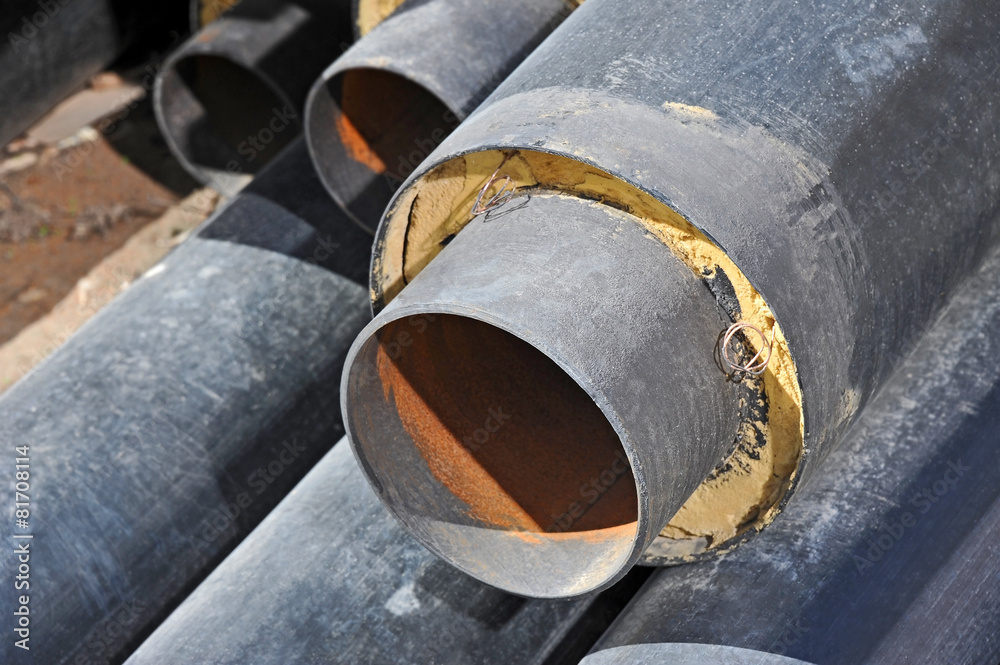 Steel pipe with heat insulation on construction site Steel pipe with heat insulation on construction site