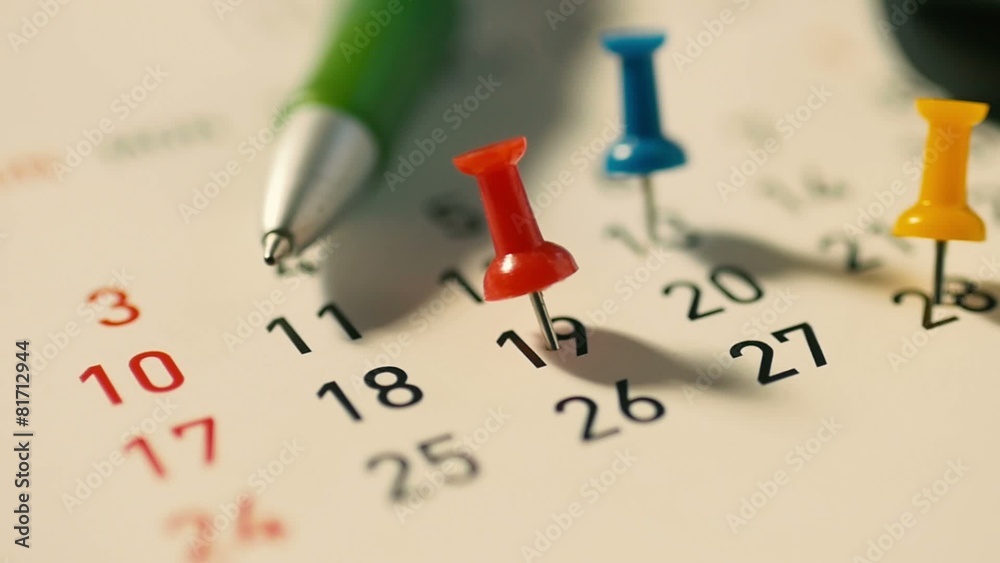 Dolly shot Push pin on a calendar Dolly shot Push pin on a calendar