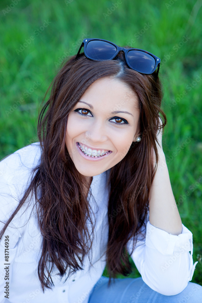 Brunette cool girl with brackets outside Brunette cool girl with brackets outside