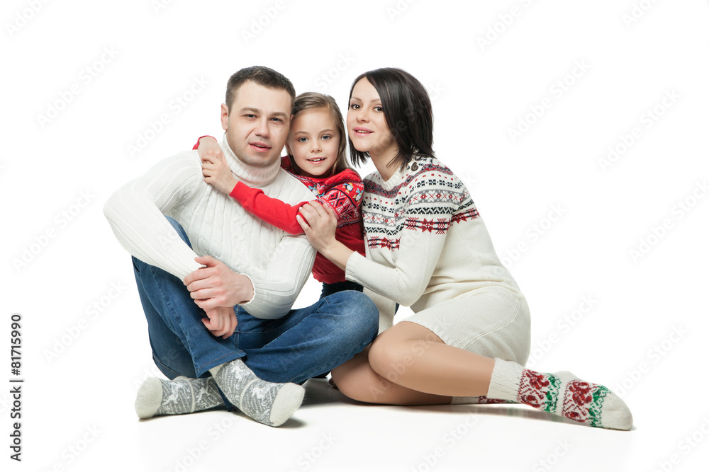 portrait of happy young family sitting together portrait of happy young family sitting together