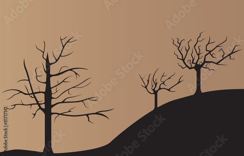 Sad dark dead trees background