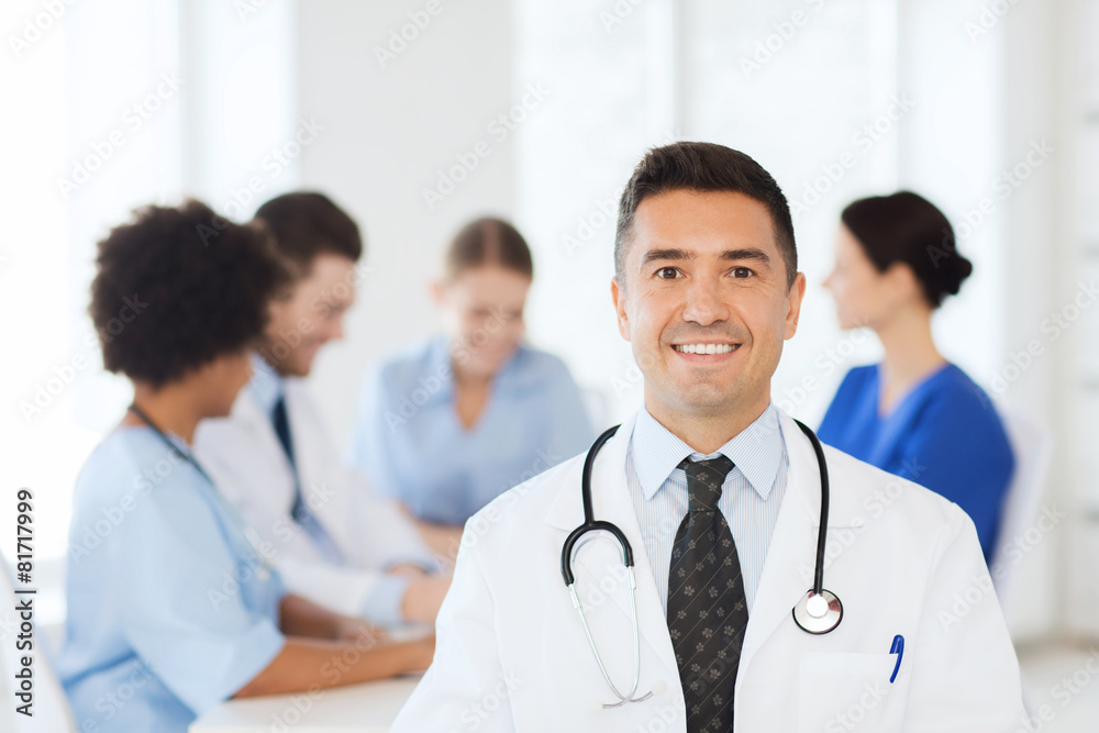 happy doctor over group of medics at hospital happy doctor over group of medics at hospital