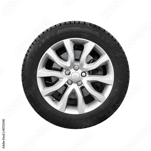 New shiny automotive wheel on light alloy disc isolated