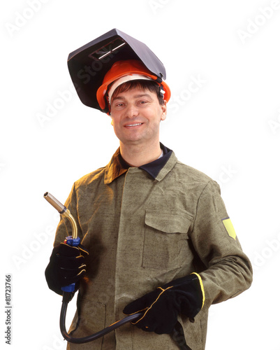 Portrait of happy male welder standing over white background