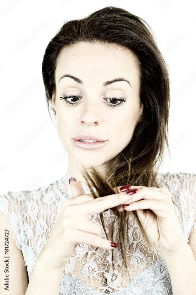 Naklejka premium Woman scared about her ruined hair with split ends