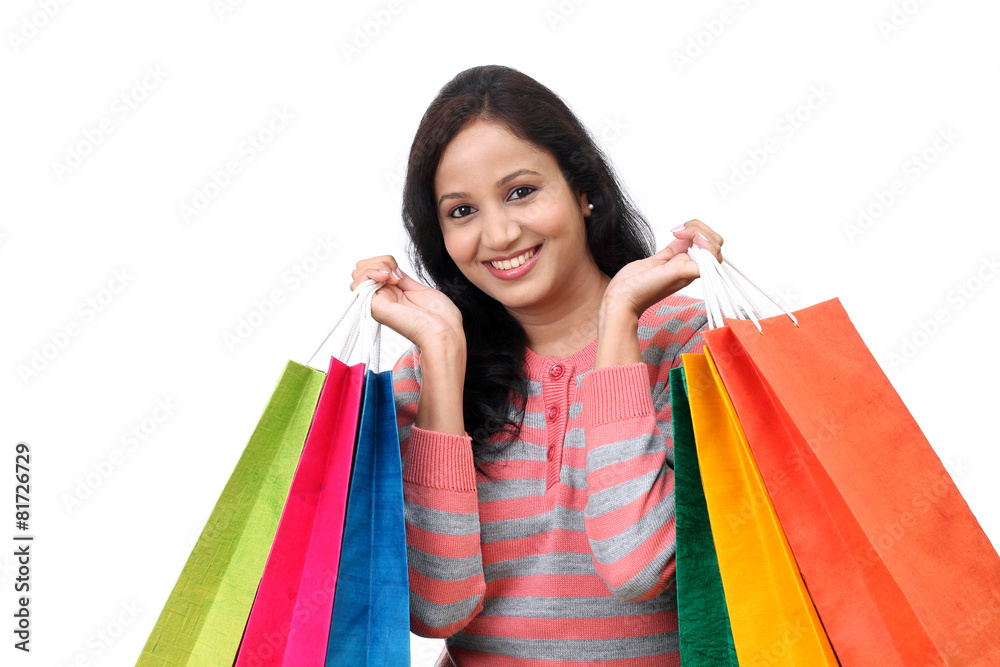 Young happy smiling woman with shopping bags Young happy smiling woman with shopping bags