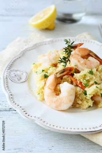 Delicious couscous with shrimp and parsley