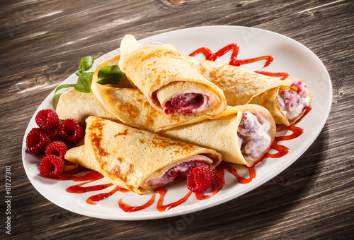 Crepes with raspberries and cream