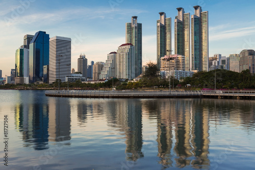 Water pool at Public Park with office building © pranodhm