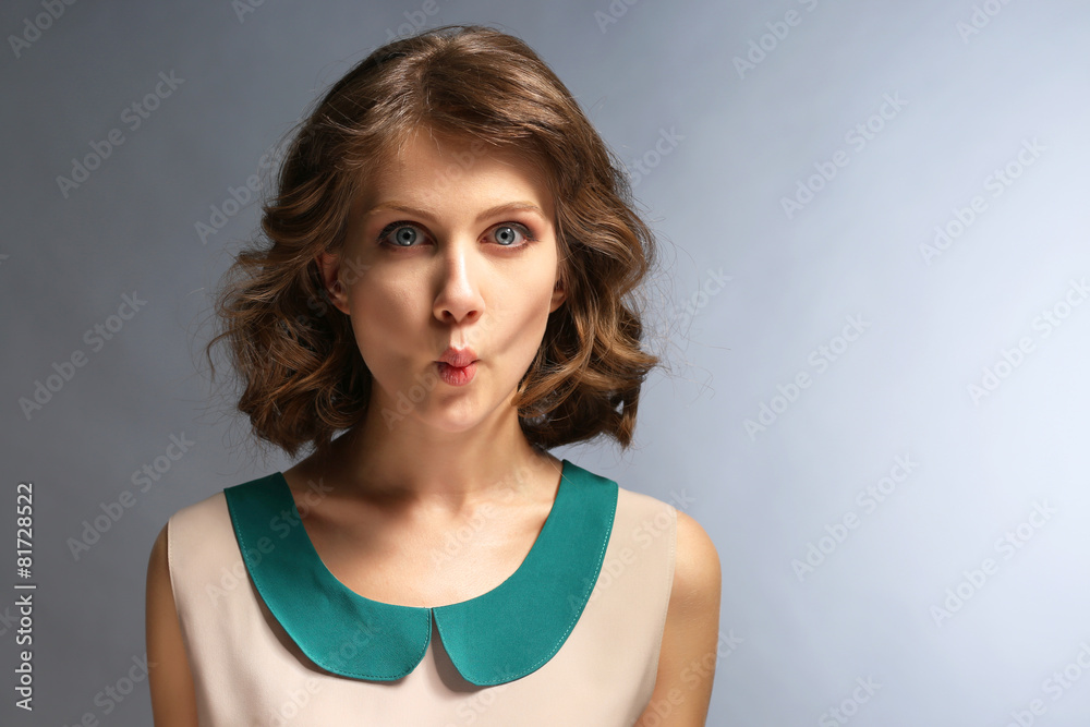 Portrait of beautiful model on gray background Portrait of beautiful model on gray background