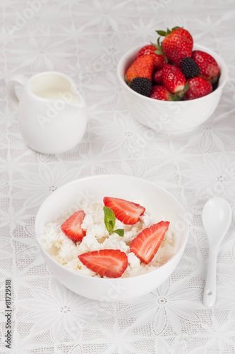 cottage cheese with fresh strawberries in the bowl