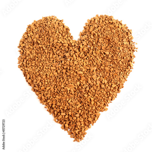 Ground coffee in shape of heart isolated on white