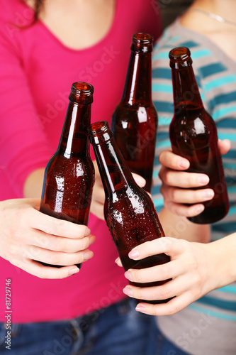 Beer in female hands, closeup