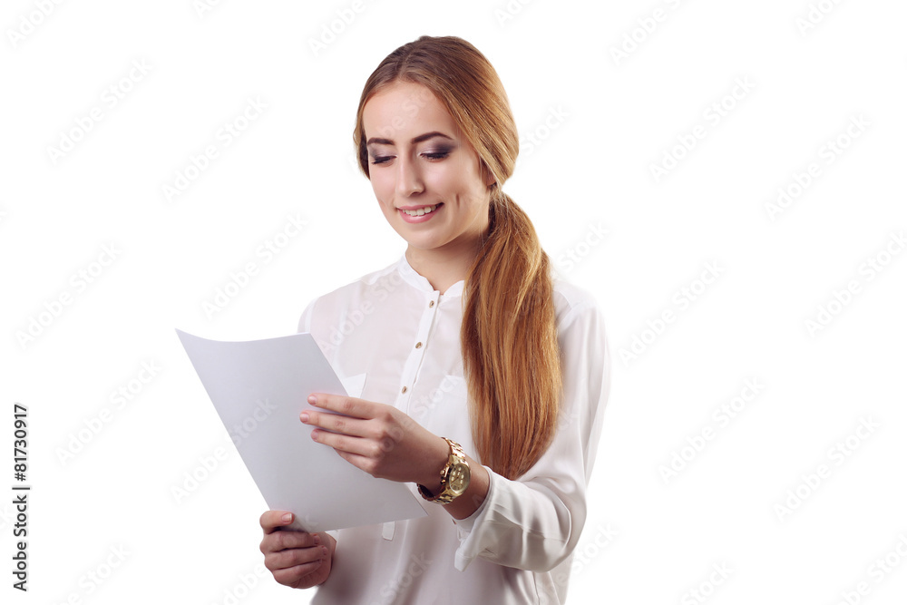 Smiling businesswoman reading paper documents. All isolated on w Smiling businesswoman reading paper documents. All isolated on w