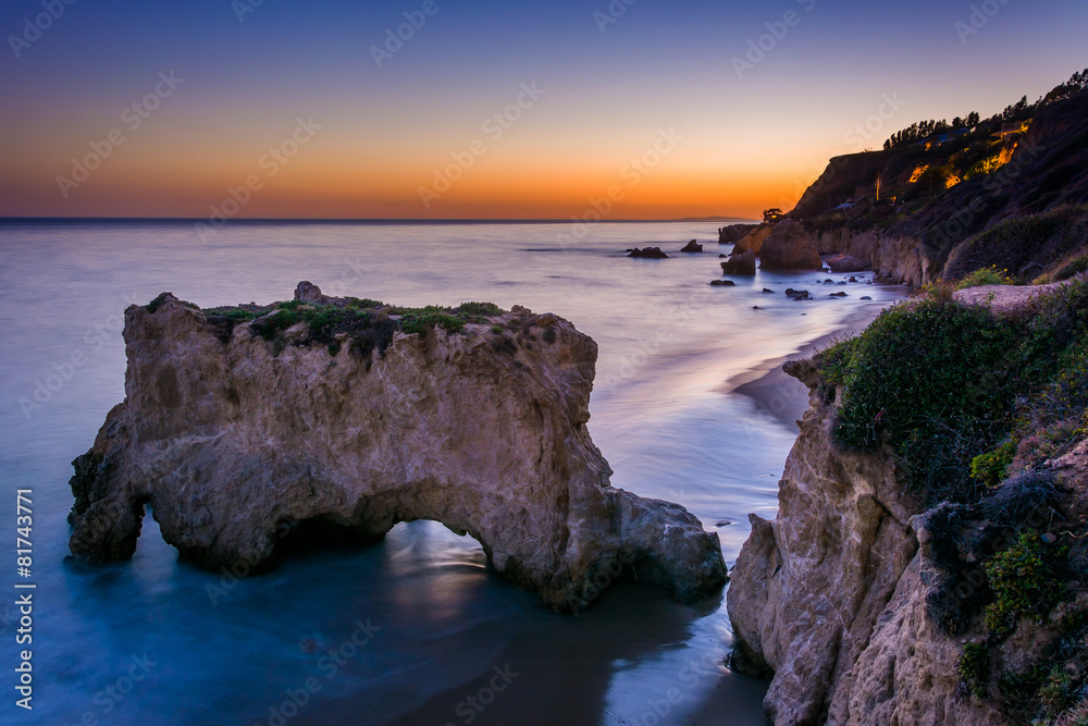 Sea stack and view of the Pacific Ocean at sunset, from cliffs a