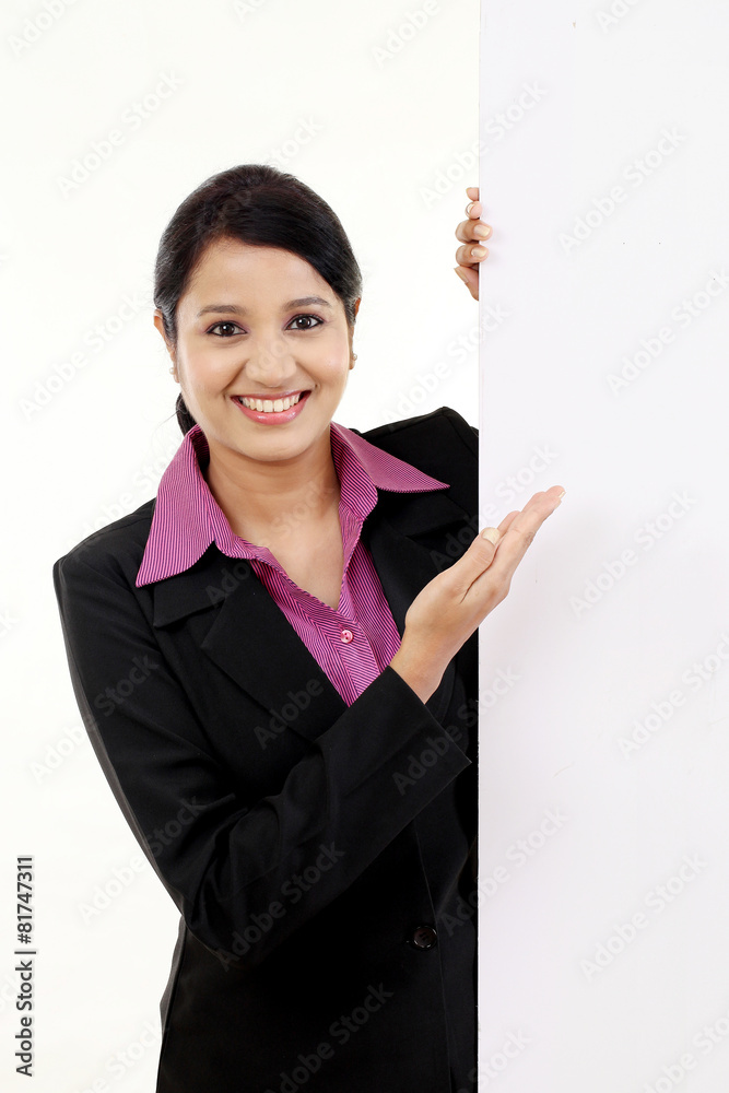 happy business woman showing blank signboard happy business woman showing blank signboard
