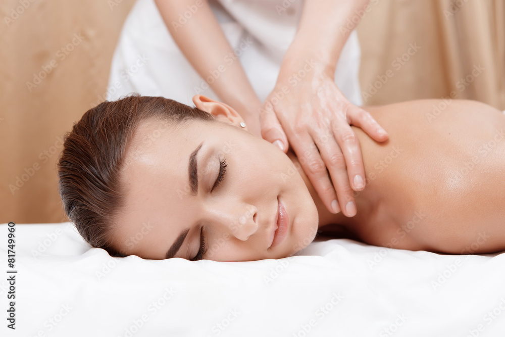 Masseur gives neck and shoulder massage Masseur gives neck and shoulder massage